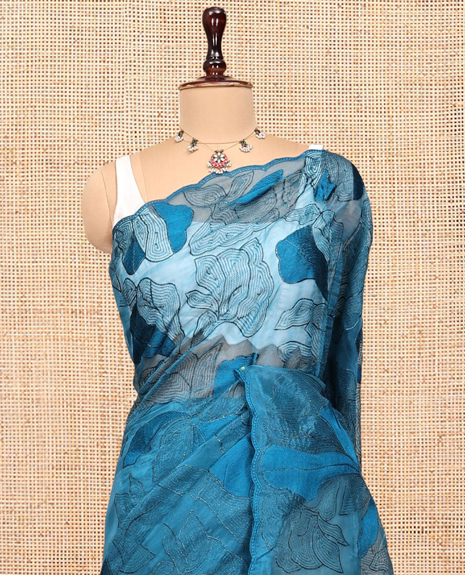 Blue Organza Saree, Steeped in the Prettiness of Floral Thread Embroidery, a Scalloped Embroidery Border, and a Matching Embroidered Blouse