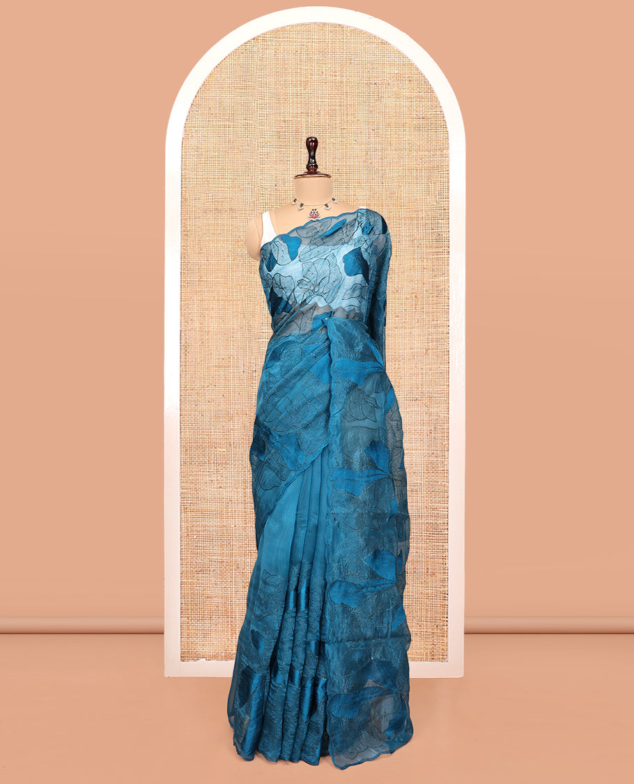 Blue Organza Saree, Steeped in the Prettiness of Floral Thread Embroidery, a Scalloped Embroidery Border, and a Matching Embroidered Blouse