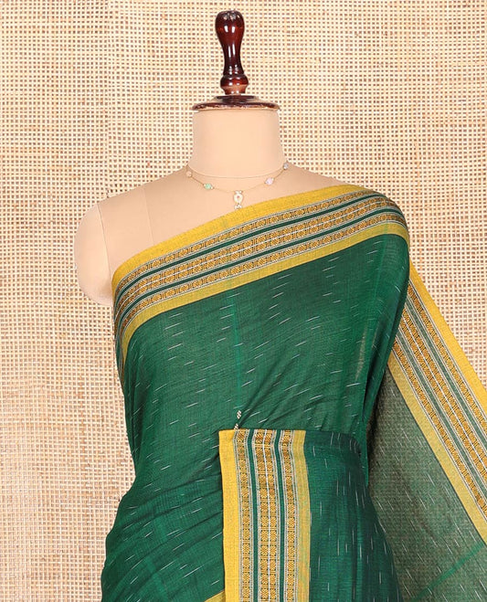 Green Odisha Cotton Saree, Subtly Woven with Buttas All Over the Body, Complemented by a Contrast Temple Border of Geometric Patterns, Captivating Contrast Pallu Features Diamond Patterns, and Has No Blouse