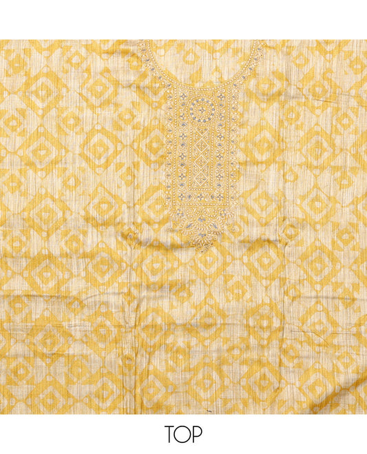 Yellow material chudidar set, batik style printed with neck embroidered top, contrast plain bottom, and batik printed dupatta