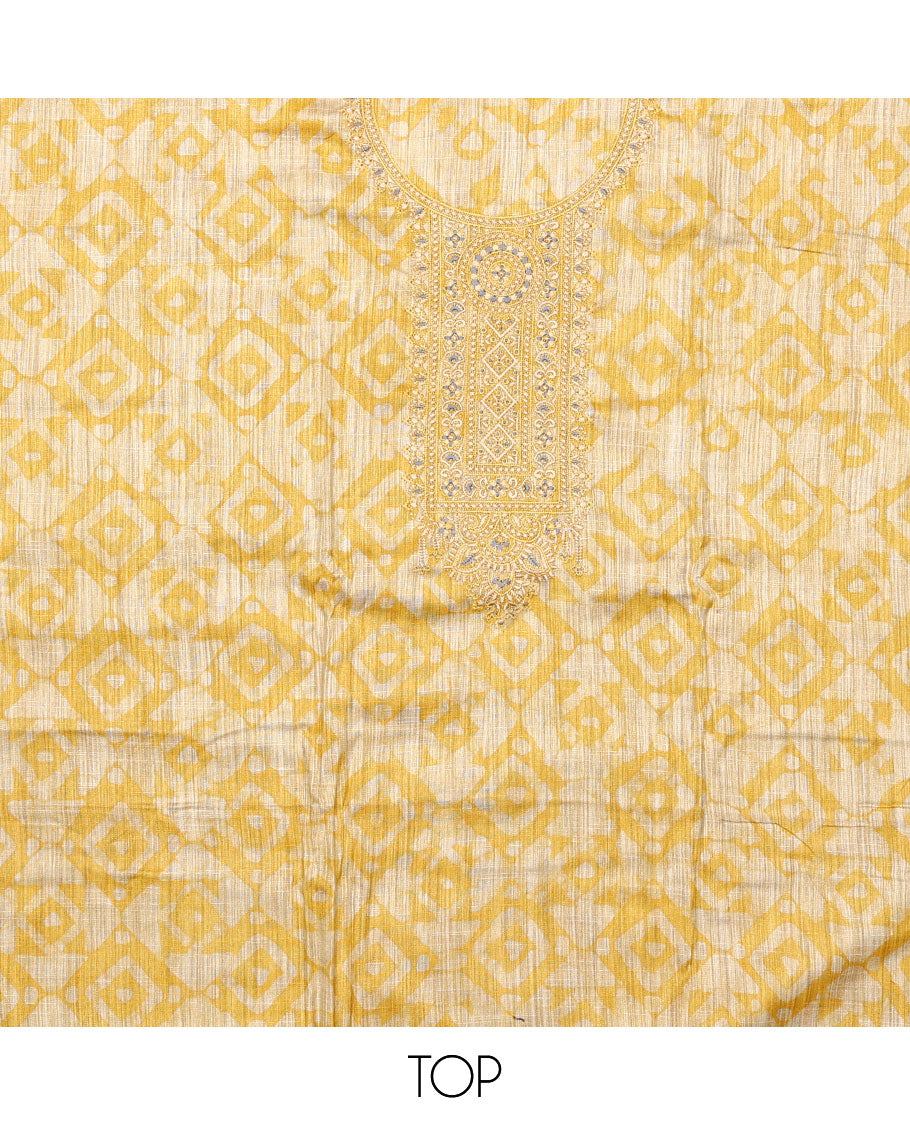 Yellow material chudidar set, batik style printed with neck embroidered top, contrast plain bottom, and batik printed dupatta