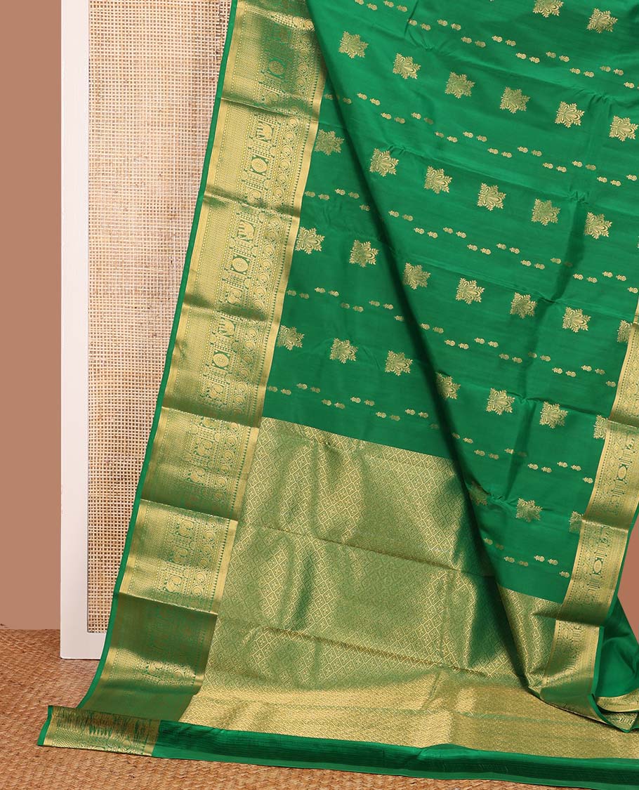 Green zari buttas Vasundhara silk mix saree, zari border of thilakam,diamond,manga, mayil chakram,yaanai, and mayil kann, and jaal pallu