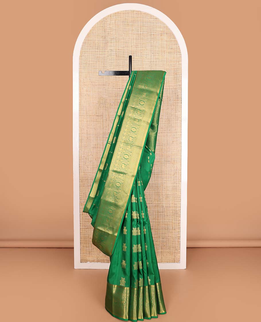 Green zari buttas Vasundhara silk mix saree, zari border of thilakam,diamond,manga, mayil chakram,yaanai, and mayil kann, and jaal pallu