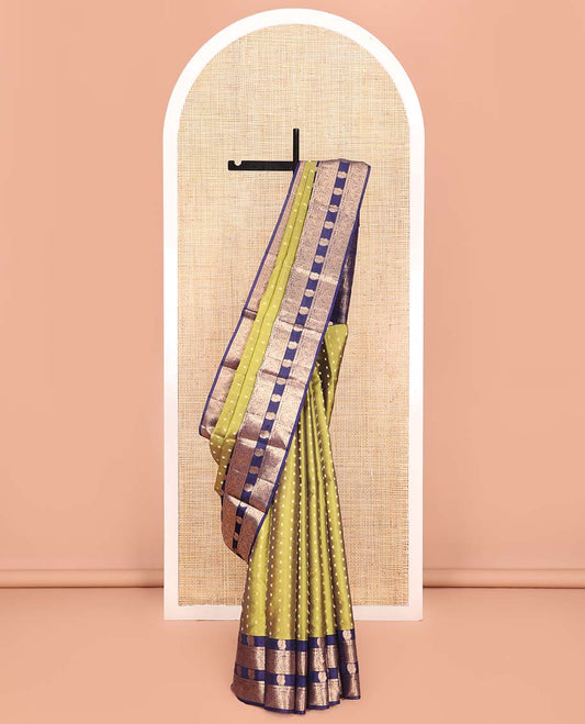 Green Vasundhara Lite Silk Mix Saree, Prettified with Zari Buttas All Over Its Body, Complemented by a Contrast Border Steeped with Mayil Designs, Pallu Steeped with Mayil Designs, and Paired with a Contrast Blouse