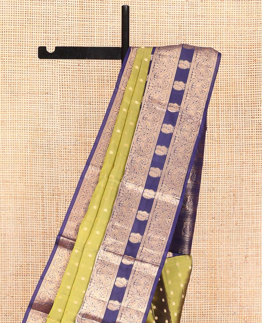 Green Vasundhara Lite Silk Mix Saree, Prettified with Zari Buttas All Over Its Body, Complemented by a Contrast Border Steeped with Mayil Designs, Pallu Steeped with Mayil Designs, and Paired with a Contrast Blouse