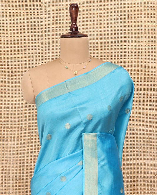 Blue Banana Pith Saree, Sparsely Woven with Buttas All Over Its Body, Subtle Self-Border, Pallu Steeped with Stripes, and Paired with a Matching Blouse