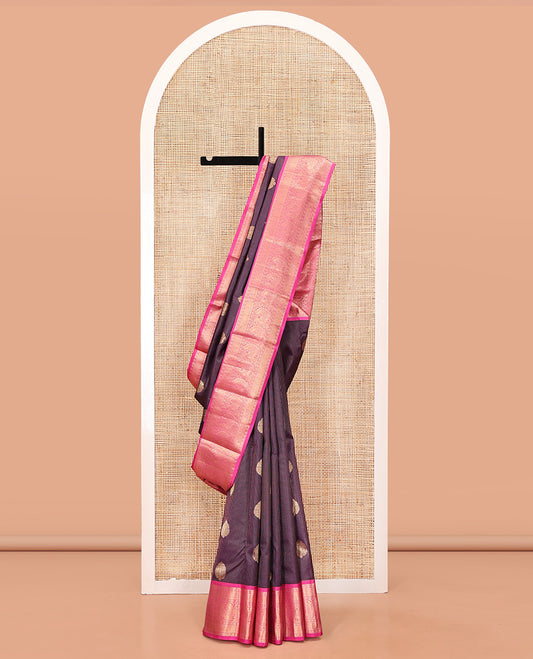 Purple Vasundhara Silk Saree, Detailed with Zari Buttas and Stripes All Over Its Body, Complemented by a Contrast Border of Rekku, Muthu, Poun, Chakram, and Mayil Designs, Grand Manga Design Pallu, and Paired with a Contrast Blouse