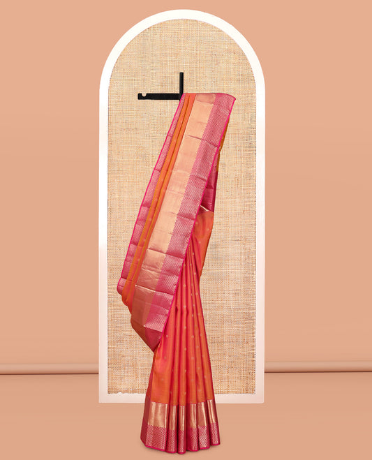 Orange Vasundhara Silk Saree, Woven with Zari Buttas, a Contrast Geometric Patterned Border, Grand Jaal Pallu, and a Contrast Blouse