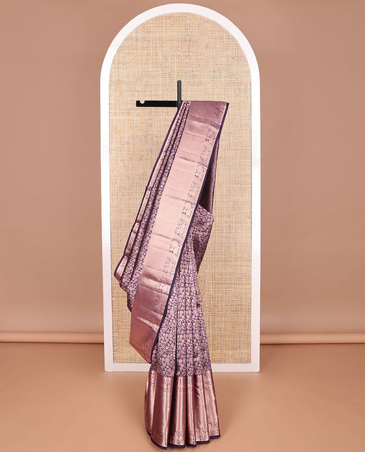 Violet floral jacquard kancheepuram silk saree with self border of mayil kann design & intricate zari design pallu