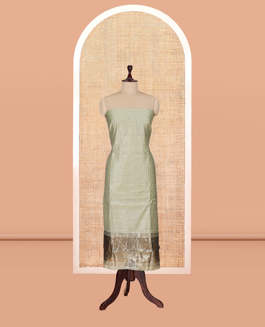 Pista Green Banarasi Chanderi Material Churidar Subtly Sparkled with Buttas Top, a Plain Bottom, and a Matching Dupatta
