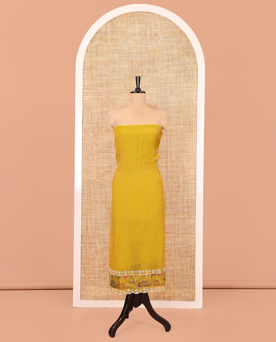 Yellow Moss Organza Material Chudidar Set, Gleamed Up with Stonework Top, a Plain Santoon Bottom, and Paired with Floral Print and Scallop Stonework Dupatta