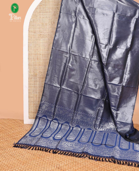 Blue silver zari tissue sailk saree with plain border & rich pallu along with butta design blouse