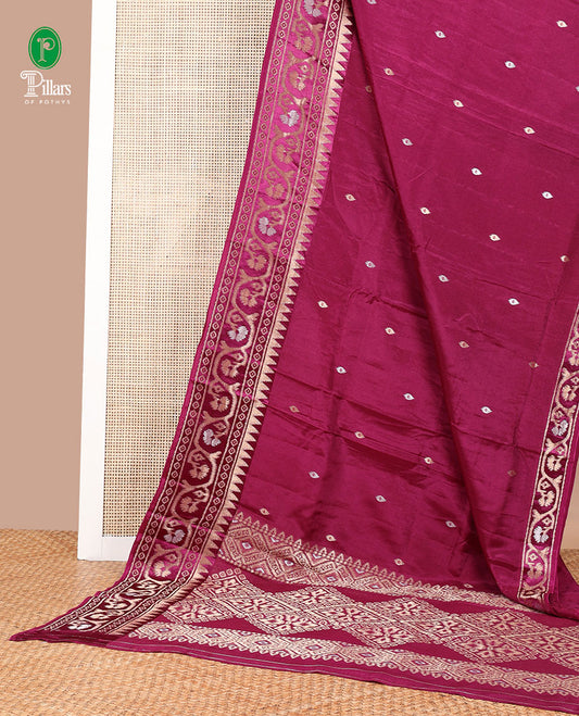 Magenta zari butta dola silk saree with patola style design, temple border & rich pallu along with plain blouse