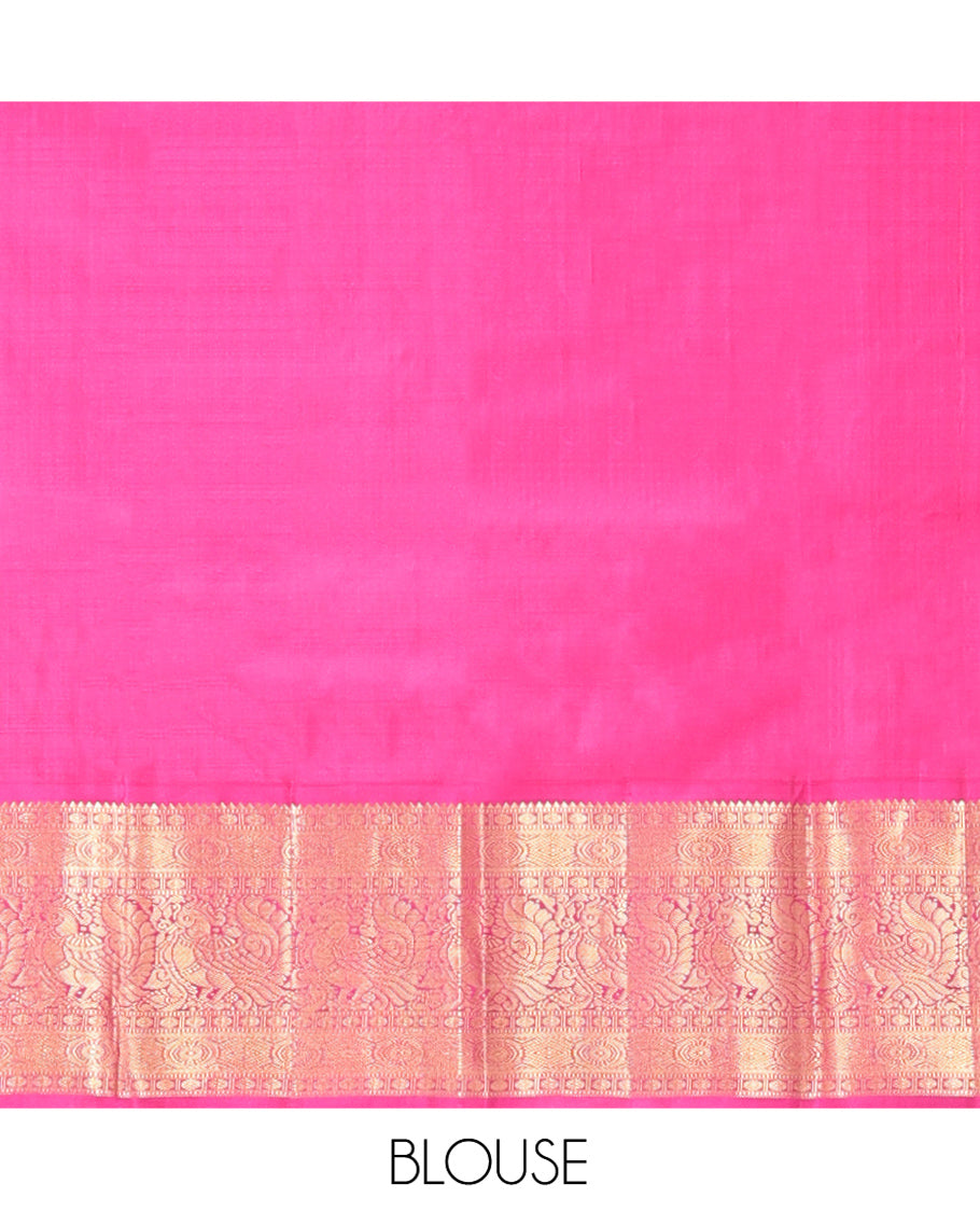 Purple Vasundhara Silk Saree, Detailed with Zari Buttas and Stripes All Over Its Body, Complemented by a Contrast Border of Rekku, Muthu, Poun, Chakram, and Mayil Designs, Grand Manga Design Pallu, and Paired with a Contrast Blouse