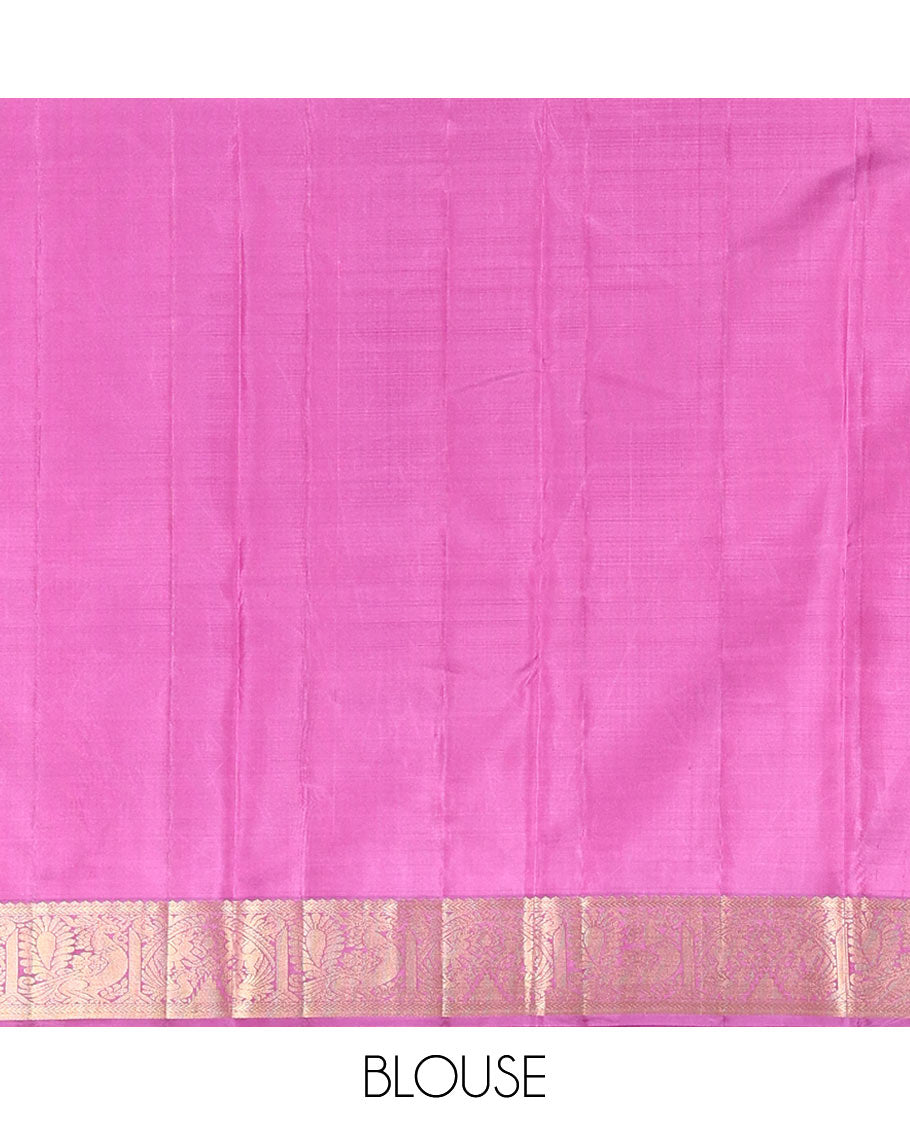 Green Vasundhara Silk Saree Embellished with Yaanai and Mayil Buttas, Complemented by a Contrast Border of Muthu, Kathir, Mayil, and Yaanai Designs, Pallu Embellished with Diagonal Stripes, and Paired with a Contrast Blouse