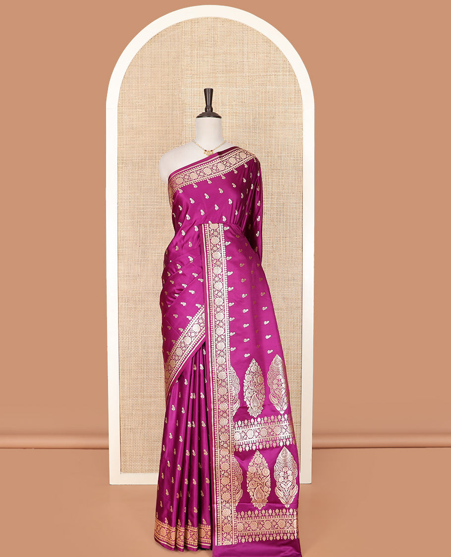 Purple Semi-Banaras Satin Saree Richly Detailed with Zari Buttas, Subtly Sparkled Border of Floral Creeper Designs, Pallu Prettified with Mughal-Style Intricate Motifs in Zari, and Paired with a Matching Blouse