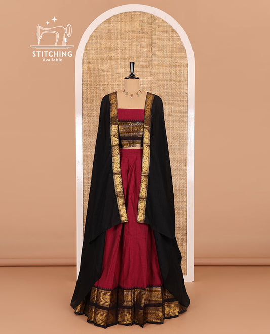Magenta-black sungudi cotton half-saree, plain with contrast traditional zari varisai pettu bordered skirt, a matching blouse, and a zari bordered dhavani