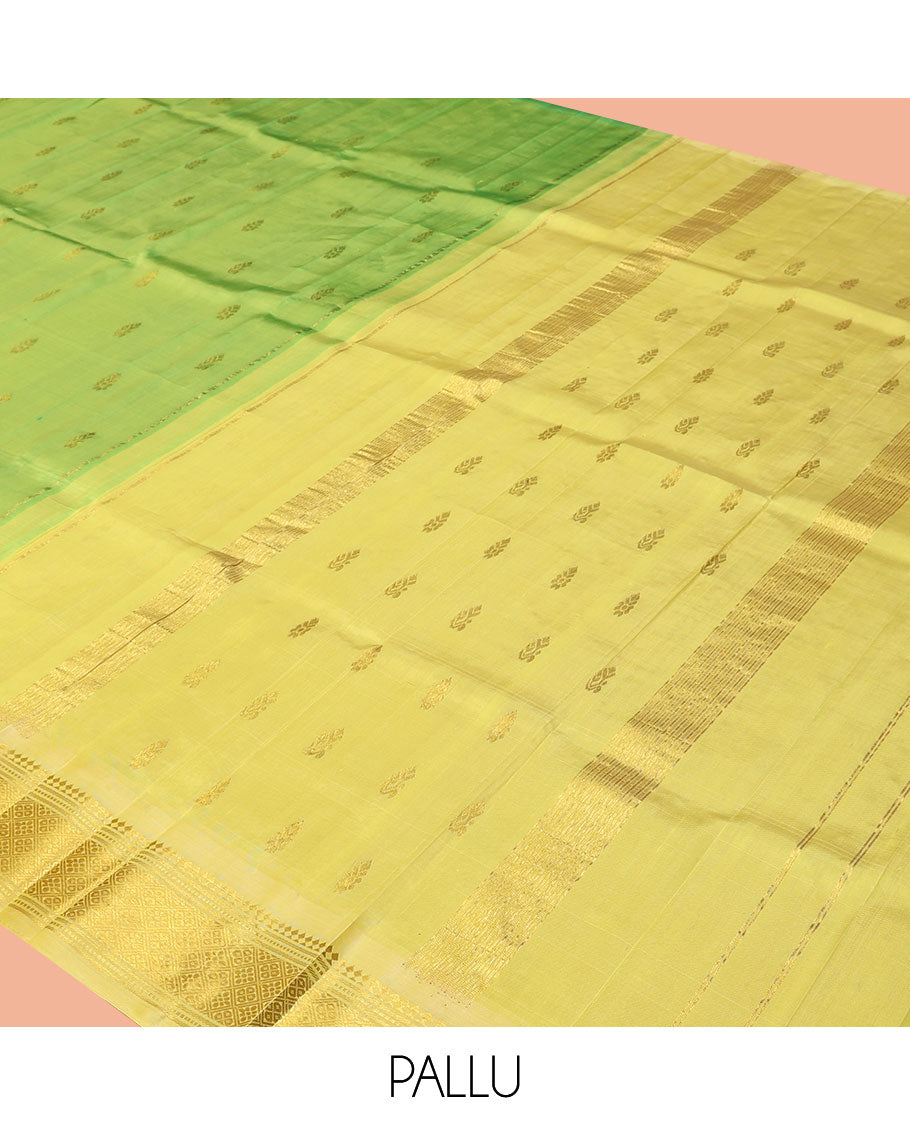 Green Kanchipuram Silk Saree, Woven with Zari Buttas, a Contrast One-Sided Border of Panner Sombu, Banaras, Muthu, and Jaal Designs, a Zari Design Pallu, and No Blouse