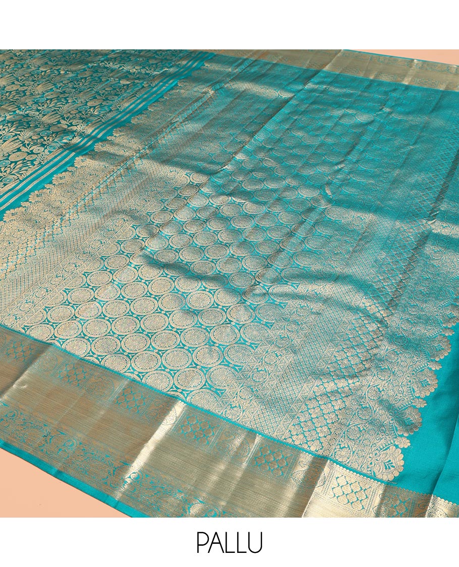 Blue Kanchipuram Wedding Silk Saree, Embellished with Jacquard Design, a Zari Border of Manga and Kodi Visiry Designs, Grand Pallu, and a Matching Blouse