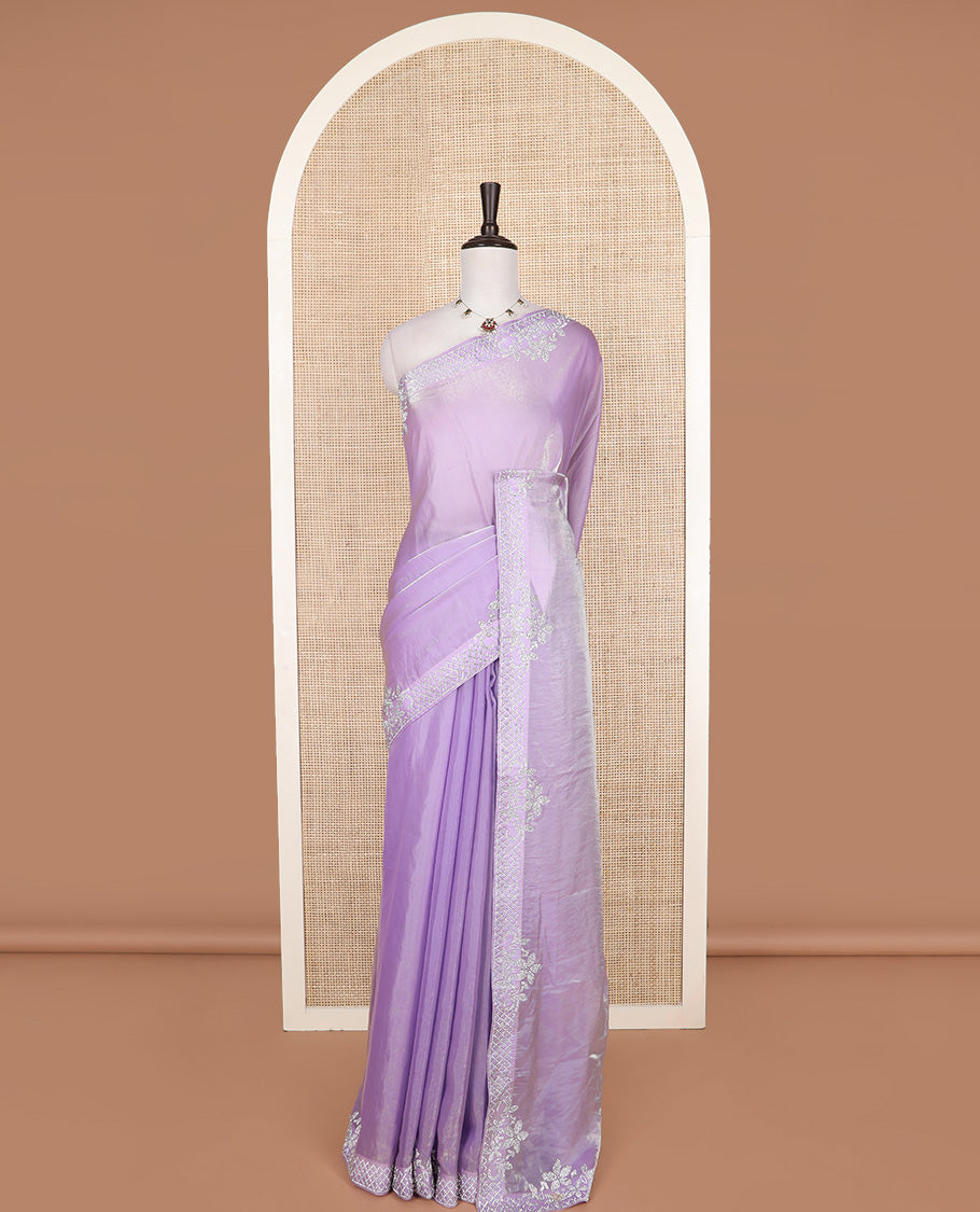 Lavender color designer saree, jaal and floral motifs crystal stone work border