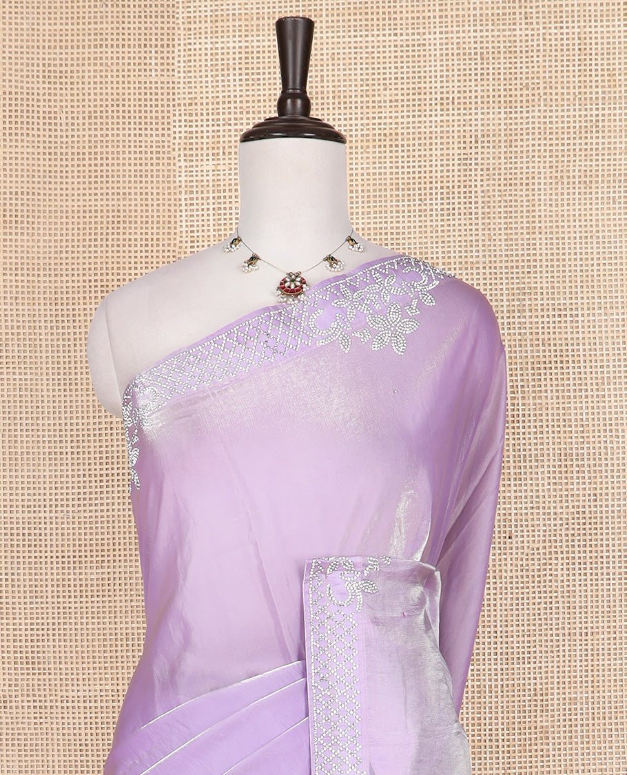 Lavender color designer saree, jaal and floral motifs crystal stone work border