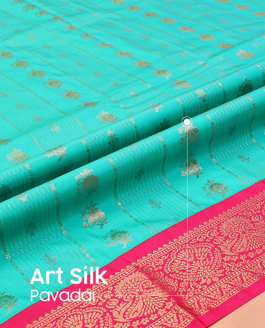 Light Turquoise Art Silk Pavadai Material Set, Graced with Zari Design on Its Skirt, Complemented by a Contrast Zari Design Border, and Paired with a Contrast Blouse