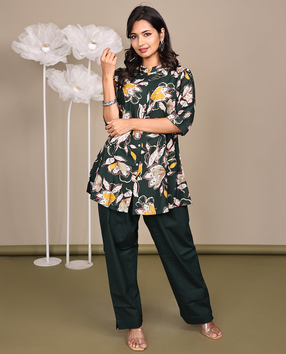 Green Floral Printed Above-The-Knee Short Rayon Kurti Comes with a Chinese Collar, 3/4 Sleeves, and A-Line Length