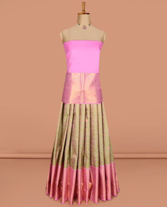 Green pure-silk half saree, jaal jacquard with contrast traditional zari bordered skirt, blouse of rekku, paisa, banaras, rekku, diamond, and then kuli kann, and intricate dhavani