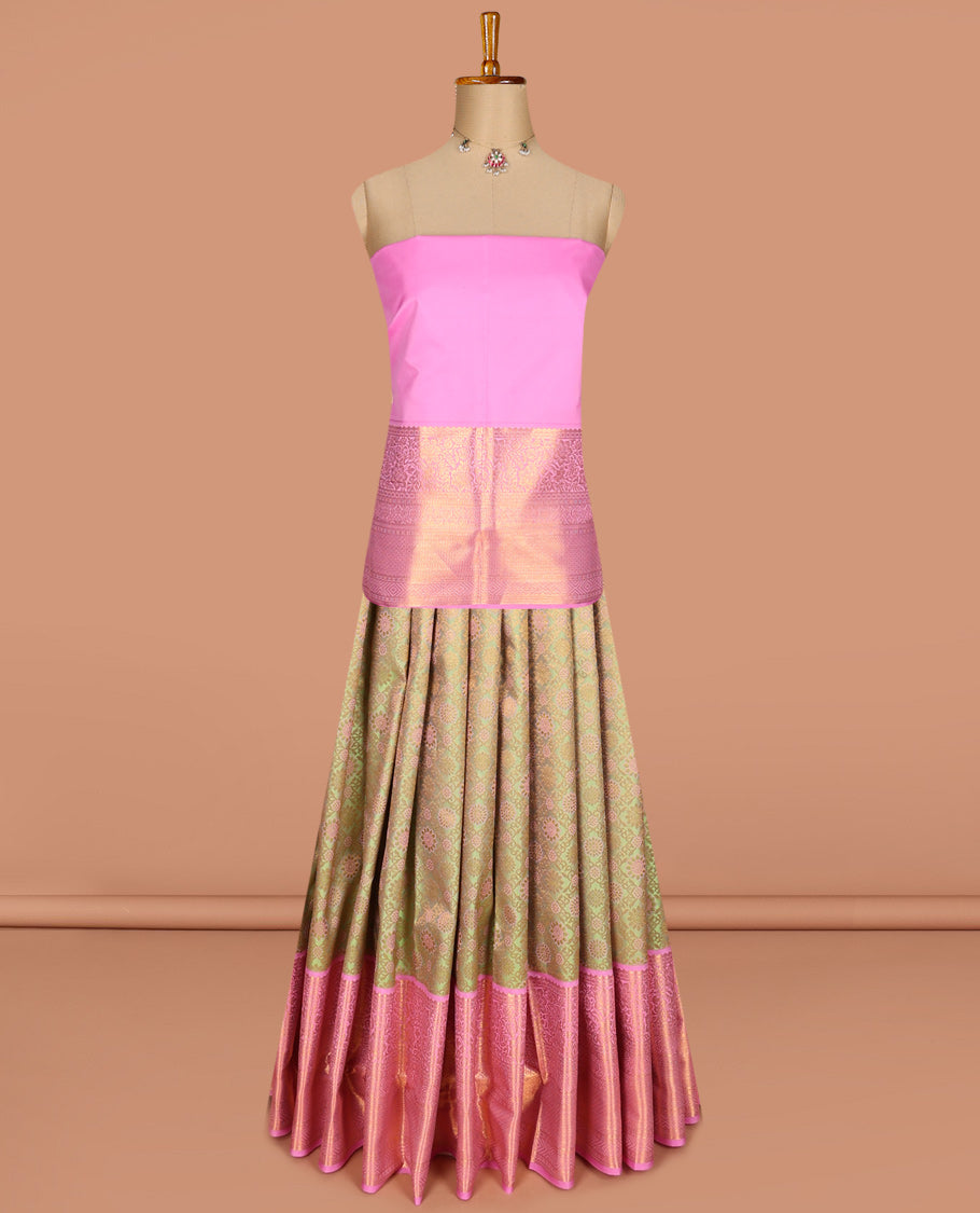Green pure-silk half saree, jaal jacquard with contrast traditional zari bordered skirt, blouse of rekku, paisa, banaras, rekku, diamond, and then kuli kann, and intricate dhavani