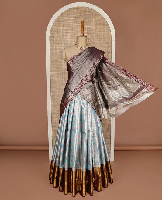 Blue puresilk halfsaree, floral jaal jacquard skirt, contrast blouse, and border of salngai,neli,poun,jaal,manga and jaal, and dhavani of embossed with zari weave