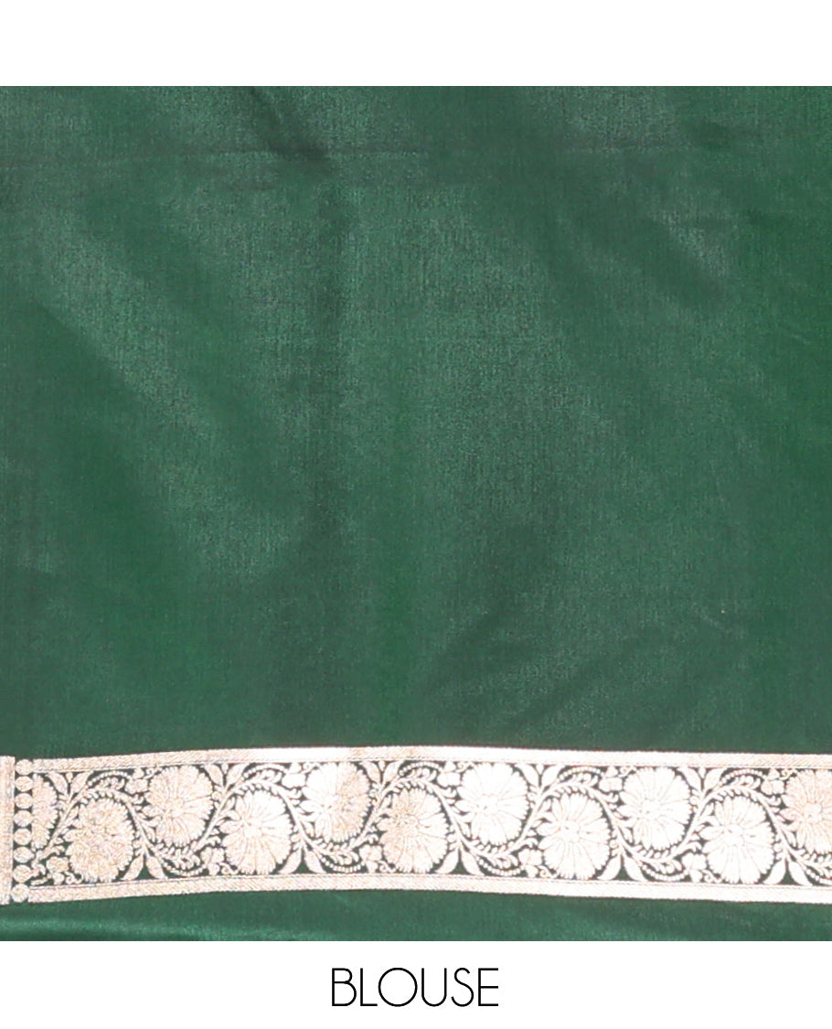 Green Banarasi Nylon Saree, Beautifully Bedecked with Buttas, a Floral Creeper Zari Border, Intricate Pallu, and a Matching Blouse