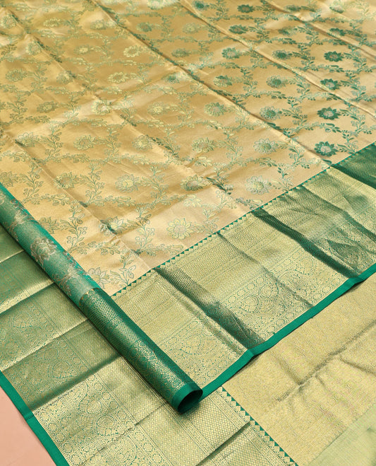 Gold Floral Jacquard Kanchipuram Tissue Silk Saree, Complemented by a Contrast Border of Thilakam Mokku, Muthu, Mayil Kann, Jaal, Cross Kamalam, and Manga, Grand Pallu, and a Matching Blouse