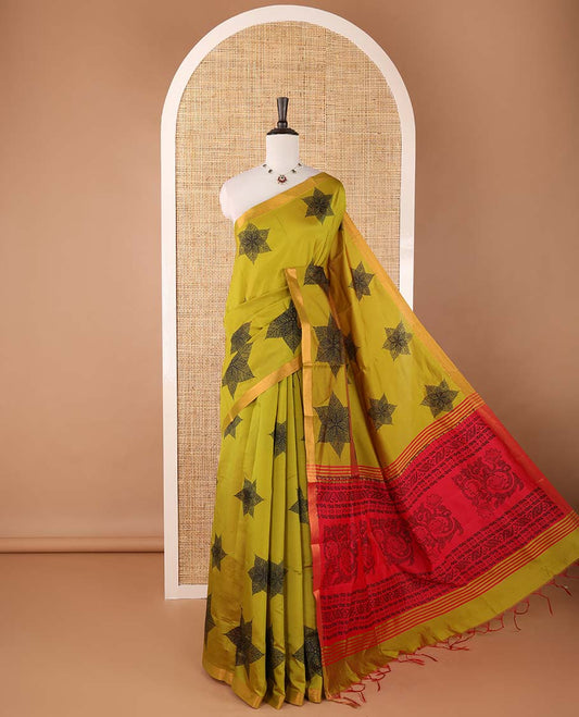 Mehendi green six-petal-like leaf motifs printed micro-silk saree, copper zari border, contrast intricate pallu & plain blouse