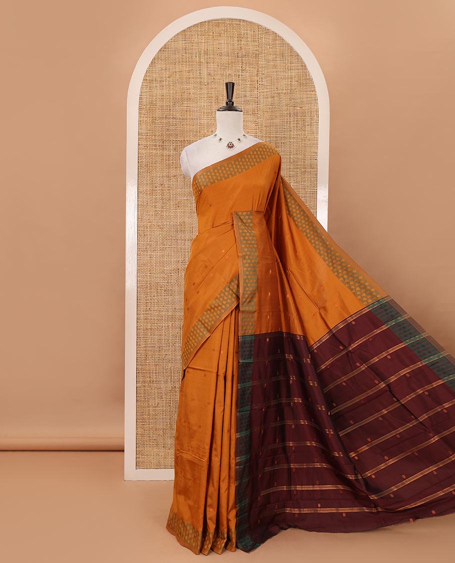 Mustard thread buttas semi-soft saree, contrast flower motifs border, contrast striped pallu & contrast buttas blouse