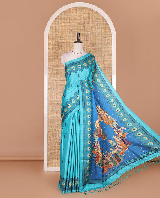 Green peacock feathers motifs printed katan silk saree, peacock feathers printed border, contrast Radha Krishna stories printed pallu, and contrast printed blouse