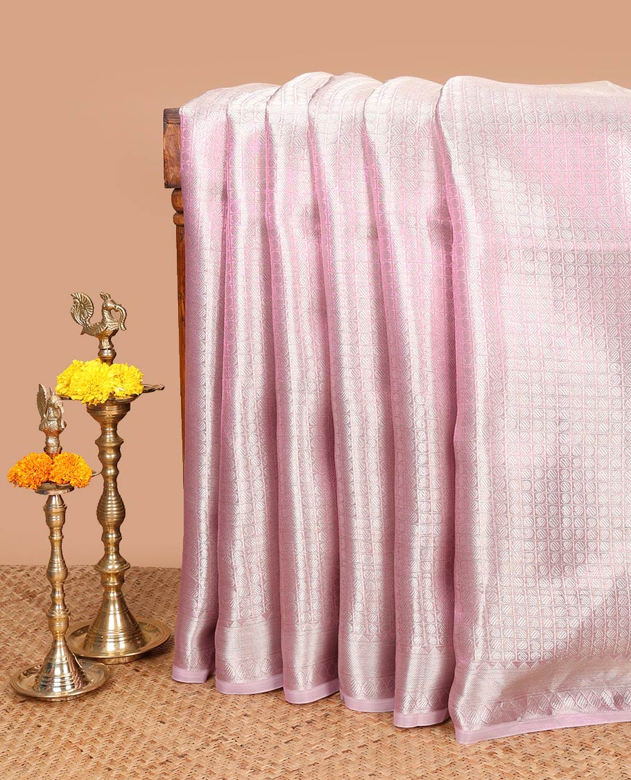 Baby pink brocade design celebrity tissue saree with self border & rich pallu along with plain blouse