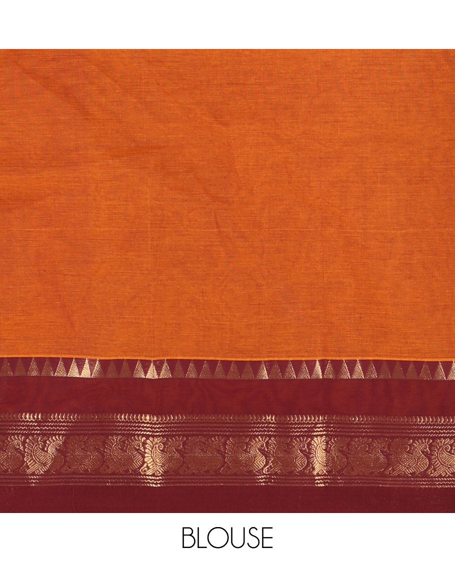 Rust Orange Plain Chettinad Cotton Saree, Complemented by Contrast Rettai Pettu Traditional Zari Border of Temple and Peacock Designs, Striped Pallu, and Paired with a Matching Blouse