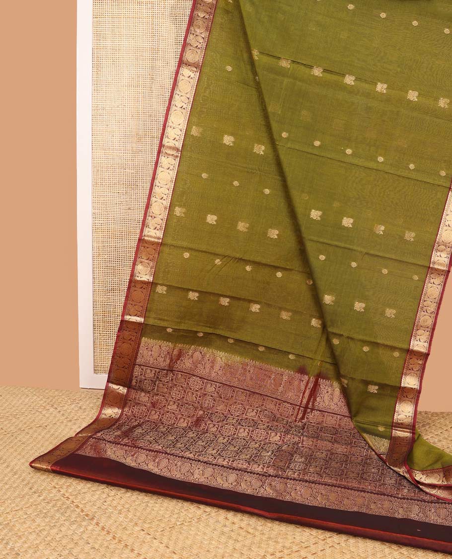 Green motifs silk cotton saree with intricate zari design border & floral design pallu