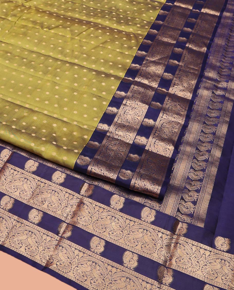 Green Vasundhara Lite Silk Mix Saree, Prettified with Zari Buttas All Over Its Body, Complemented by a Contrast Border Steeped with Mayil Designs, Pallu Steeped with Mayil Designs, and Paired with a Contrast Blouse