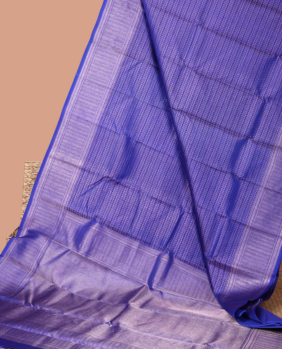 Purple  zig zag striped kancheepuram silk saree with seld striped zari border & geometric zari design pallu