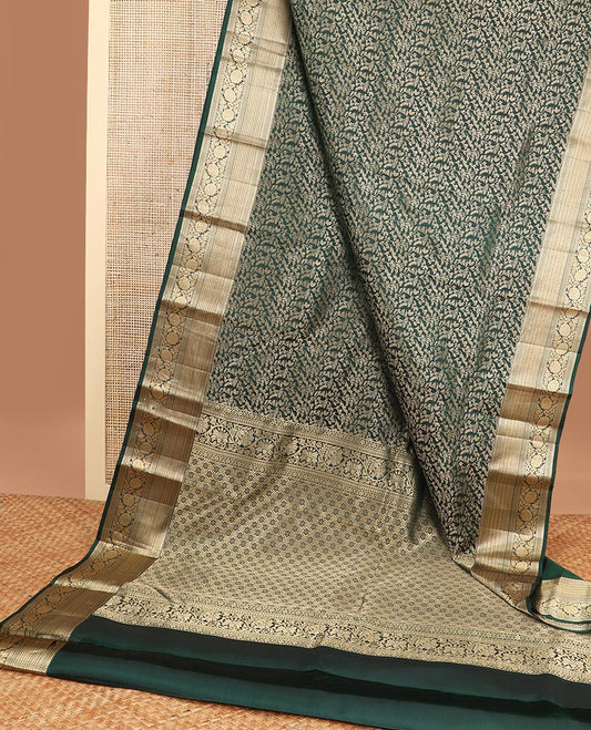 Dark green floral jaal design kancheepuram silk saree with self border of thilakam mokku, kathir, kodi visiry design & zari design pallu