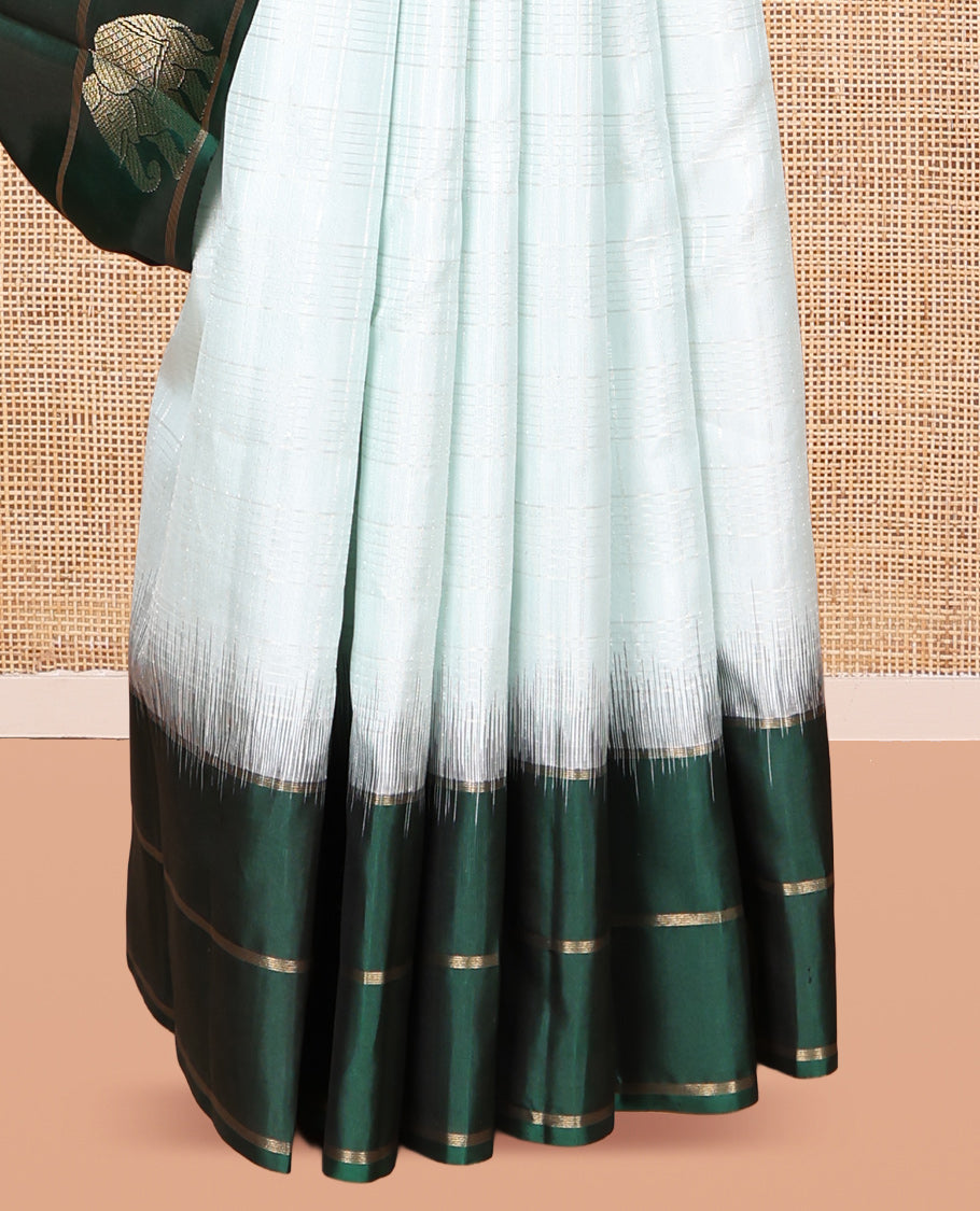Pale Blue Kanchipuram Silk Saree, Woven with Checks, a Contrast Yaanai-Peacock Buttas Border, Intricate Pallu, and a Contrast Blouse