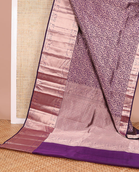 Violet floral jacquard kancheepuram silk saree with self border of mayil kann design & intricate zari design pallu