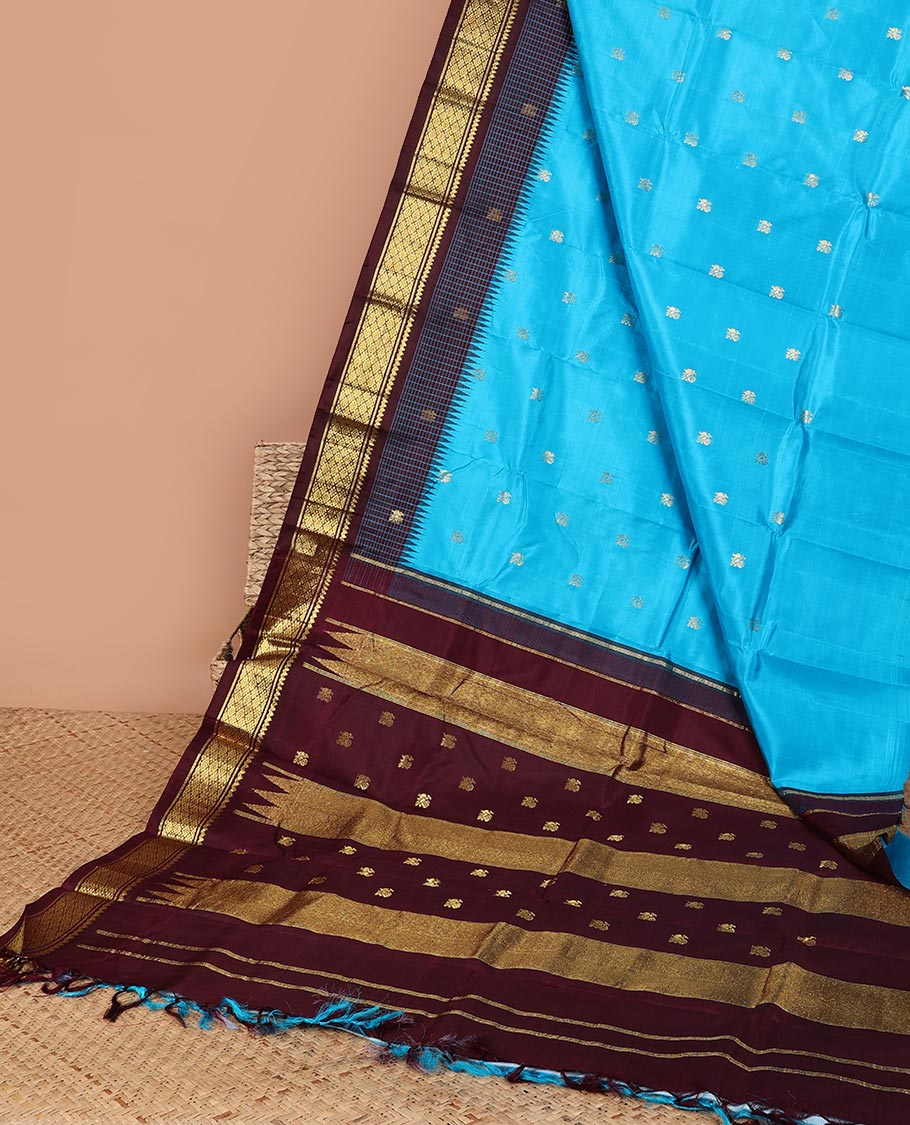 Blue peacock buttas kancheepuram silk saree with contrast border of thilakam mokku, banaras,jaal design & zari design pallu