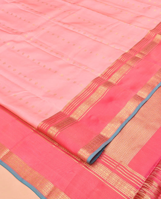 Pink Vasundhara Silk Mix Saree, Enriched with Zari Buttas All Over Its Body, Complemented by Contrast Varisai Pettu Border of Neli, Muthu, Star Kamalam, and Rudraksham Designs, Vanki Design Pallu, and Paired with a Contrast Blouse