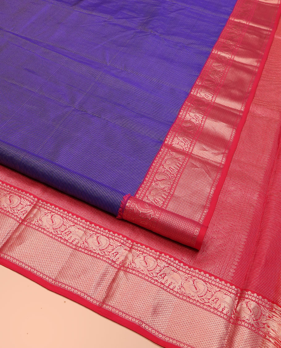 Voilet Kanchipuram Silk Saree, Beautifully Bedecked with Zari Stripes All Over Its Body, Complemented by Contrast Zari Border of Yaanai, Mayil, Kamalam, and Mayil Kann Designs, Textured Pallu, and Paired with a Contrast Blouse