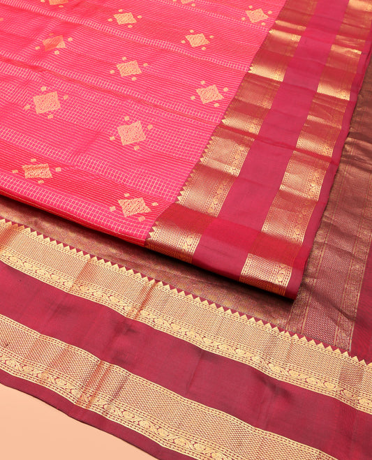 Pink Vasundhara Silk Saree, Gracefully Embellished with Zari Buttas and Checks, a Contrast Rettai Pettu Border of Rekku, Neli, Kodi Visiry, and Mayil Kann, Grand Pallu, and a Contrast Blouse