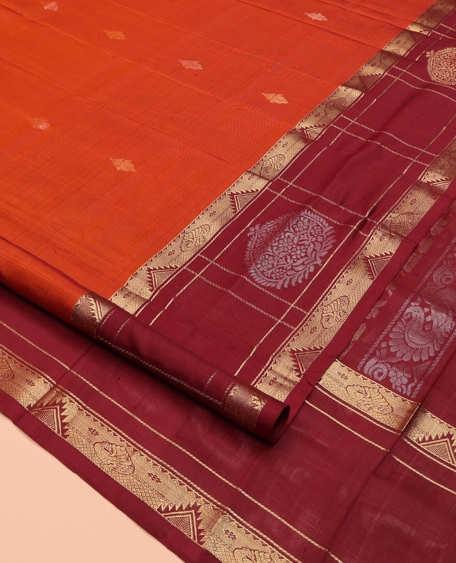 Orange Uppada Silk Saree, Mesmerized with Zari Buttas All Over Its Body, Complemented by a Contrast Traditional Border of Diamond Designs, Pallu Woven with Floral Jaal Designs, and Paired with a Contrast Blouse