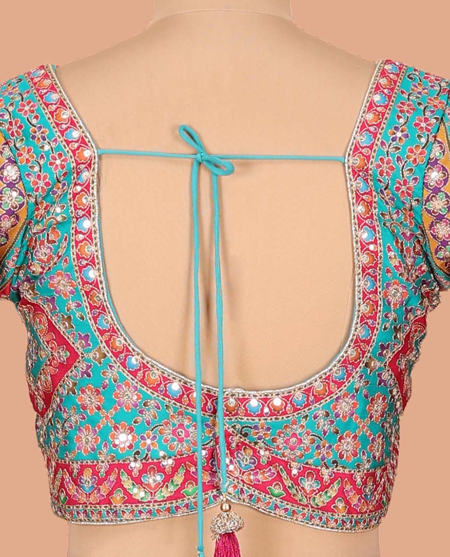 Blue Dola Silk Saree, Adorned with Intricate Designs on Its Body, Highlighted by Mughal-Style Patterns Printed Border, Intricately Designed Pallu, and Paired with a Sweet Heart Elbow Sleeve Blouse