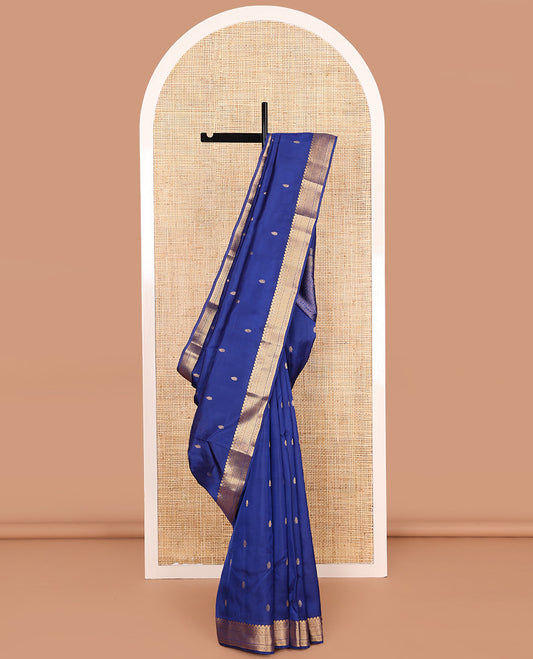 Blue zari buttas Vasundhara silk mix saree, zari border of manga mokku, muthu, neli, kamalam, and ara maadam, and pai yaadi kattam pallu